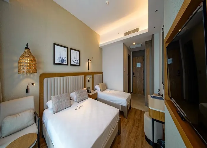 Aletris Deluxe & מלון Gundogdu (Side)